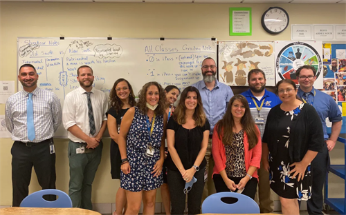 A group of teachers in a classroom